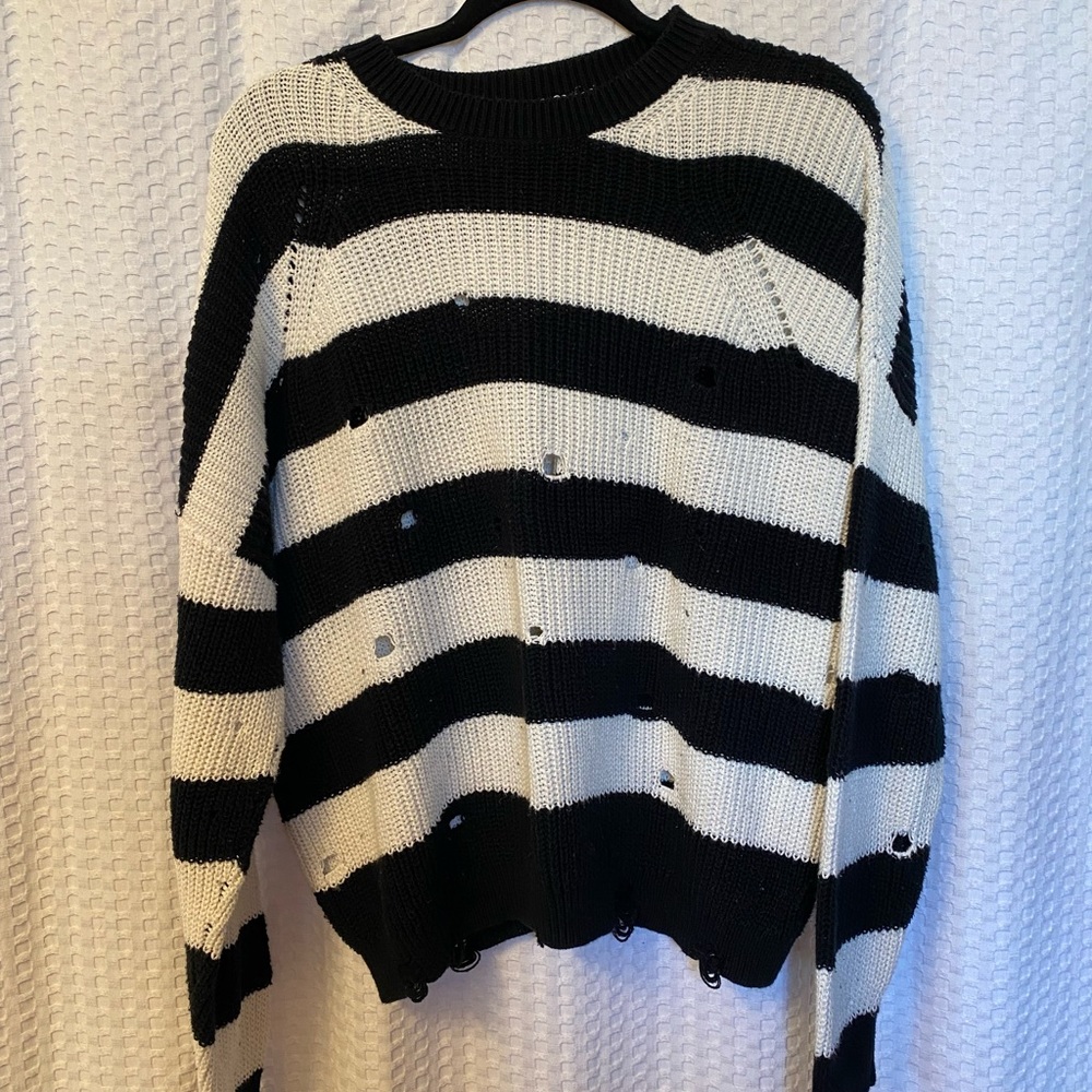 Distressed sweater